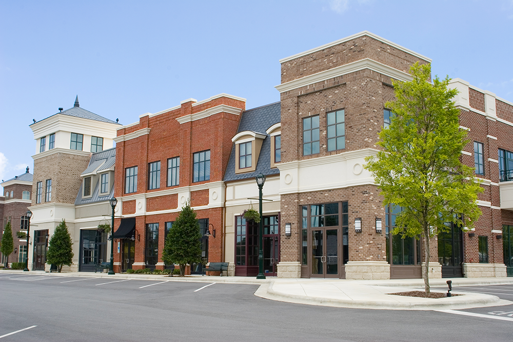 Claims professionals reviewing large loss property claim documentation